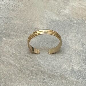 10K Yellow Gold made adjustable toe ring.